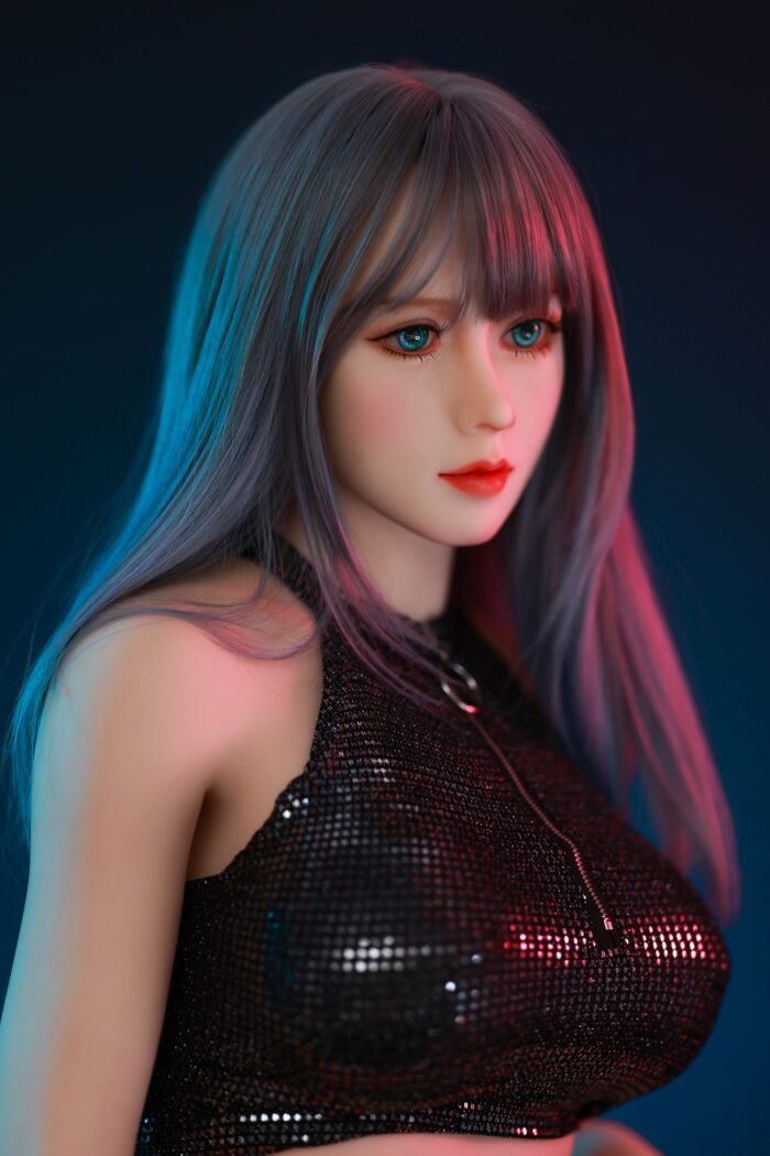 Realistic Female Sex Doll With Long Hair, Wearing A Black Sequined Top, Under Colorful Lighting For A Sensual Aesthetic.