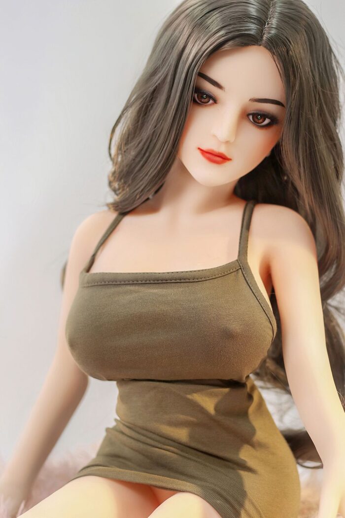 Realistic Sex Doll Mini With Detailed Facial Features And Long Brown Hair, Ideal For Companionship And Intimate Experiences. Perfect For Those Seeking A Compact, Lifelike Female Doll For Pleasure.