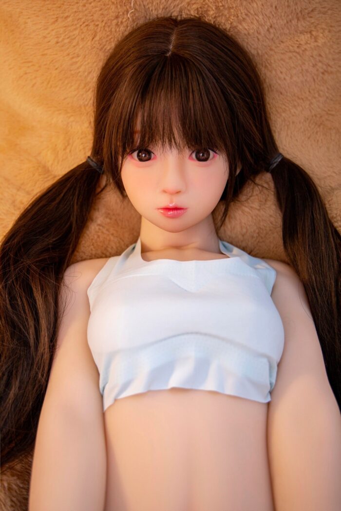 Realistic Sex Doll With Brown Pigtails And Lifelike Features For Adult Companionship.