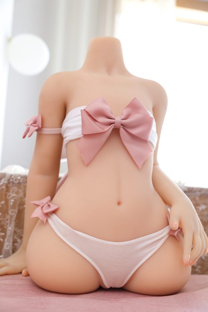 Soft Silicone Sex Doll With Realistic Features, Dressed In A Cute Pink And White Outfit With Bows, Designed For Intimate Pleasure And Companionship, Perfect For Solo Or Partner Use.