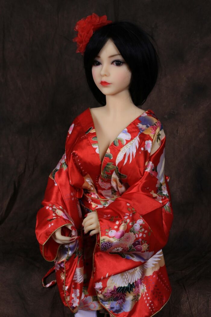 Silicone Sex Doll With Realistic Features, Dressed In Elegant Red Floral Kimono, Perfect For Adult Companionship And Intimate Moments, Ideal For Collectors And Lovers Of Premium Sex Dolls.