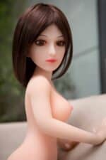Realistic sex doll with detailed facial features and lifelike skin for adult pleasure and companionship. Perfect for those seeking a mini, high-quality sex doll experience from Sexdollmini.