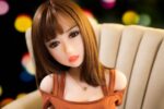 Realistic sex doll with detailed facial features and high-quality craftsmanship, designed for intimate companionship and pleasure. Perfect for adult enthusiasts seeking a lifelike experience.