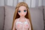 Realistic sex doll with blue eyes and long blonde hair, dressed in lace lingerie, designed for adult companionship and intimate use, high-quality silicone craftsmanship, versatile clothing options, near-life appearance, ideal for personal satisfaction.