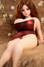 Realistic sex doll with detailed facial features and long auburn hair, dressed in a shiny red dress, situated on a plush fur surface for an intimate, life-like appearance.