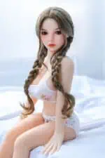 Realistic sex doll with long braided hair, lifelike facial features, and a youthful appearance, ideal for companionship and intimate experiences, perfect for adult pleasure products.