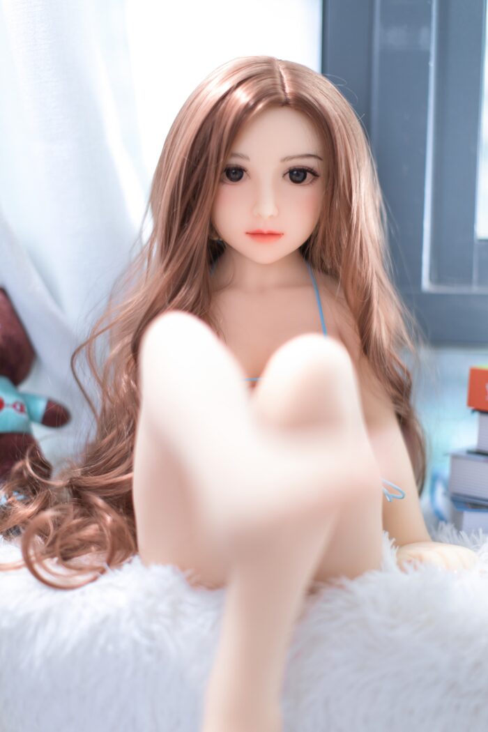 Mini Sex Doll With Realistic Features, Long Brown Hair, Lifelike Face, And Soft Skin – Perfect For Intimate Companionship. High-Quality Synthetic Material Ensures Durability And Realistic Feel For Enhanced Experience.