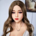 Realistic sex doll with long wavy brown hair, blue eyes, and red lips, designed for adult companionship and intimacy.