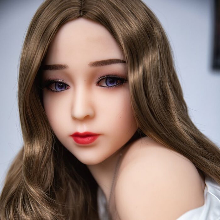 Realistic Female Doll With Long Brown Hair, Blue Eyes, And Natural Makeup, Showcasing The Fleur Beautiful Tpe Flat Sex Doll.